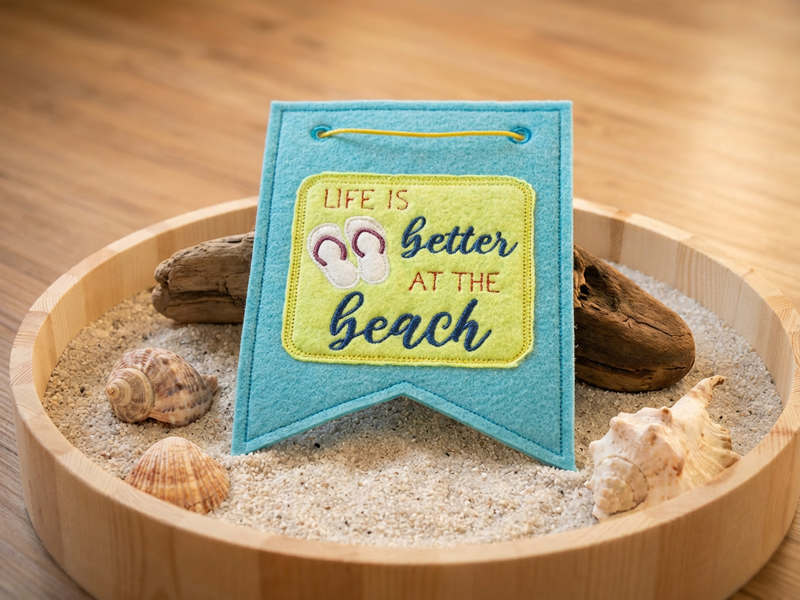 Preview: Button Life is better at the beach Spruch - Stickdatei